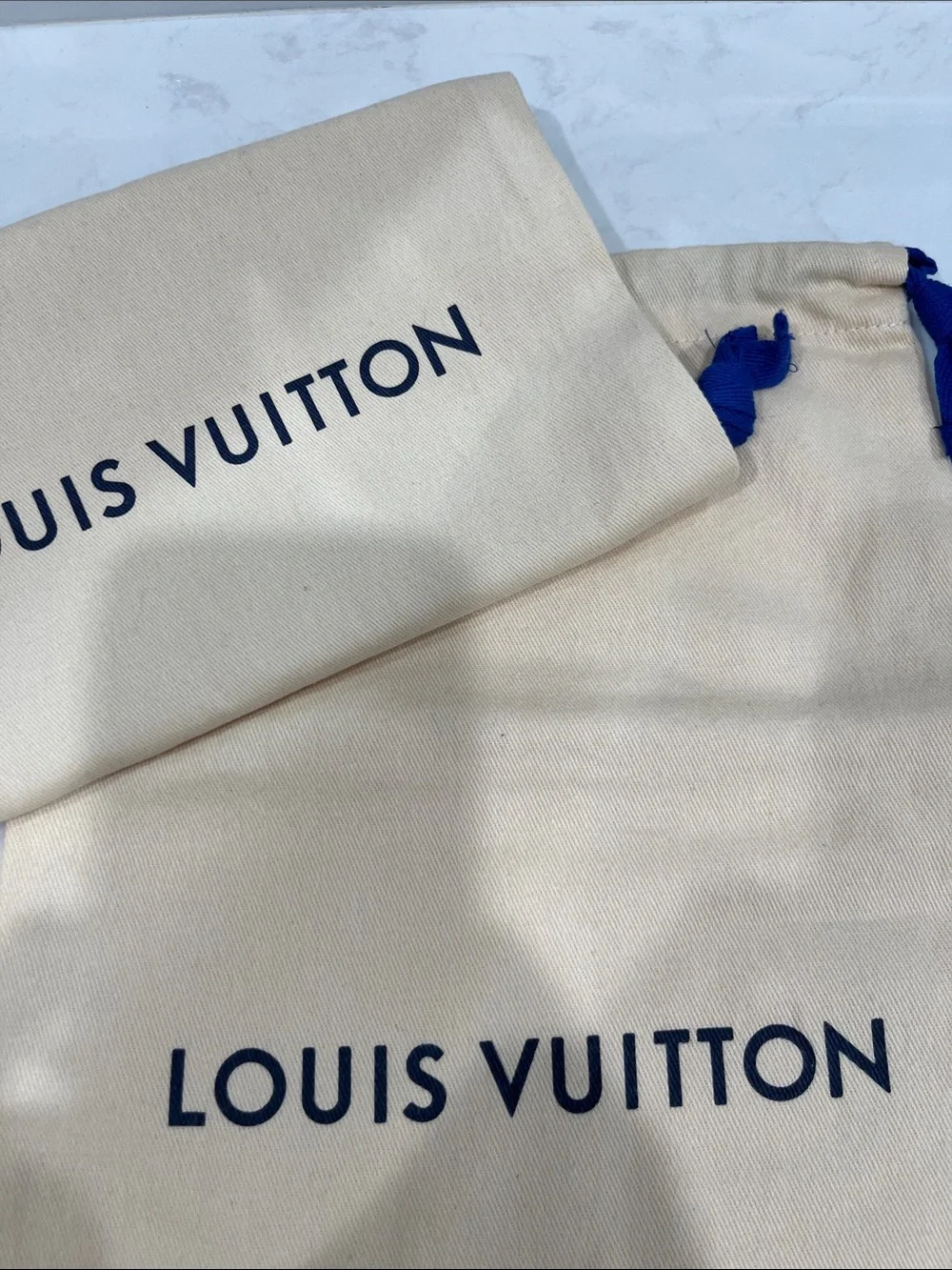 Louis Vuitton Cream Dust Bags with Navy Logo and Drawstrings